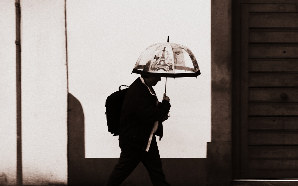 A man with a fancy umbrella